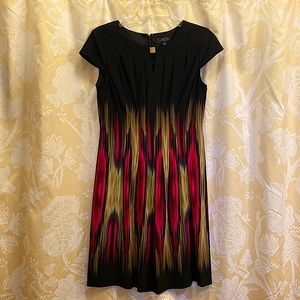 Tahari dress, Size: 10P, like new condition, very comfortable and flows nicely